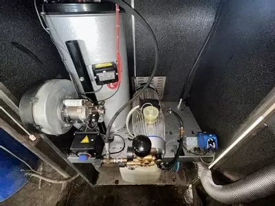 Nilfisk SH Truck Booster pressure washer reinstalled on site after full service and pump overhaul, running smoothly and ready for use.